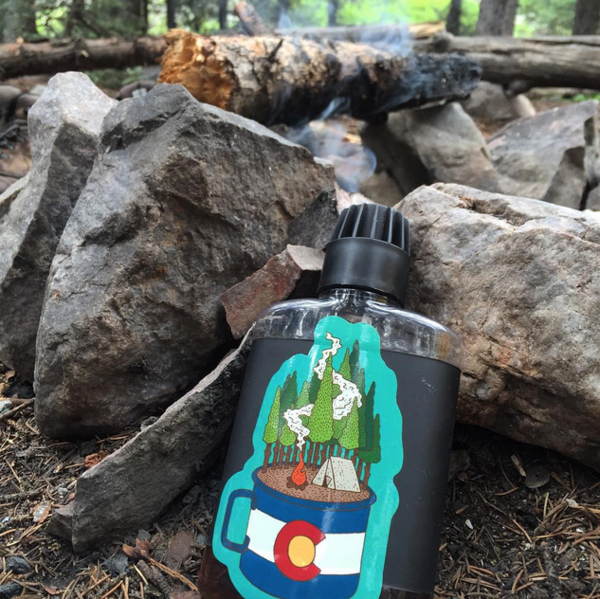 Colorado flag camp mug sticker featuring mountains and pine trees