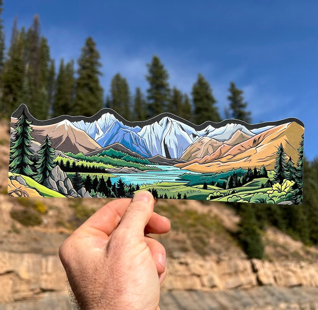 Colorado mountain and alpine lake water bottle wrap sticker displayed outdoors